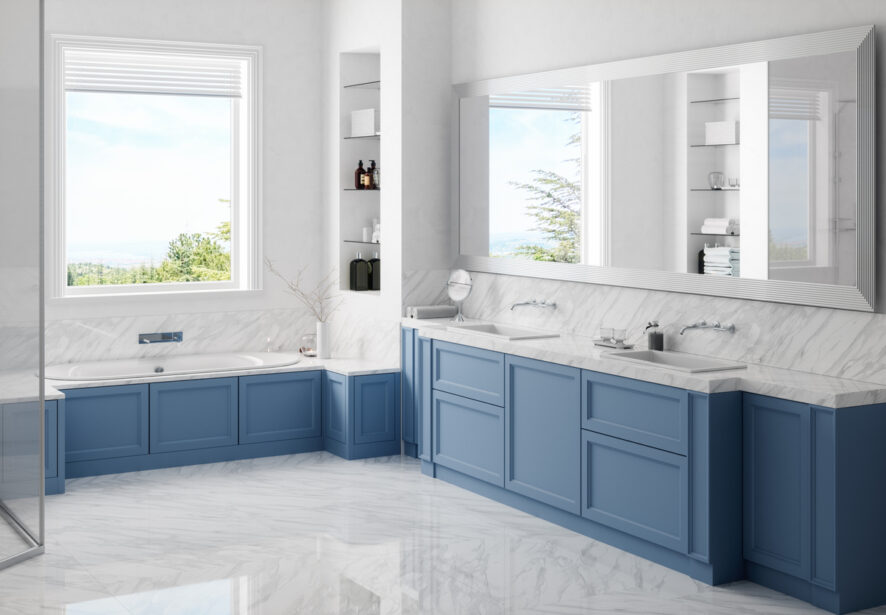 Interior of a contemporary white / blue bathroom with washstand and bathtub in Normal IL