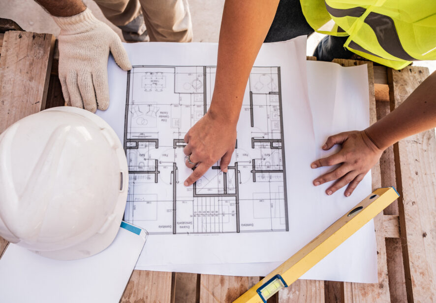 Central Illinois Construct, a "general contractor near me" reviews blue prints for a home addition