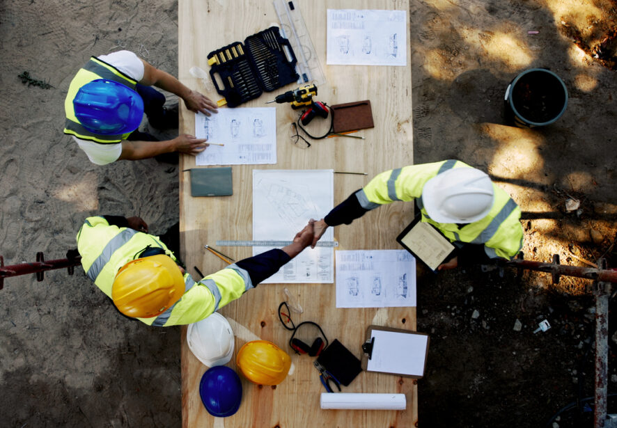 General contractors from Central Illinois Construct shake hands and compare notes